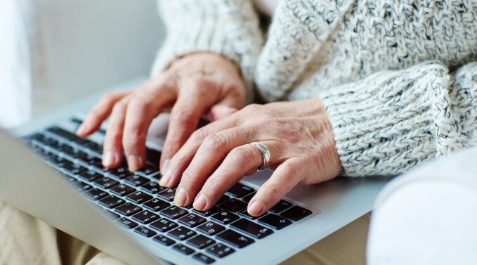 Woman typing on laptop